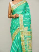 Turquoise Khaddi Georgette Saree with Brush Painted Border